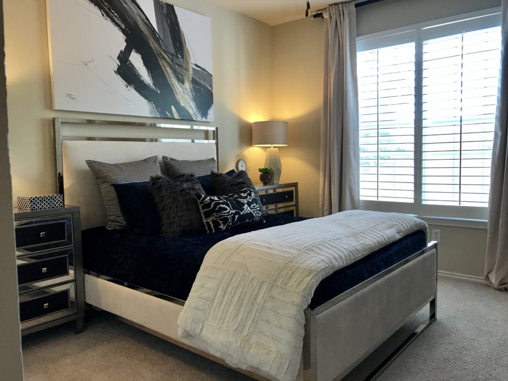 Bedroom with bedside tables in dark and light tones