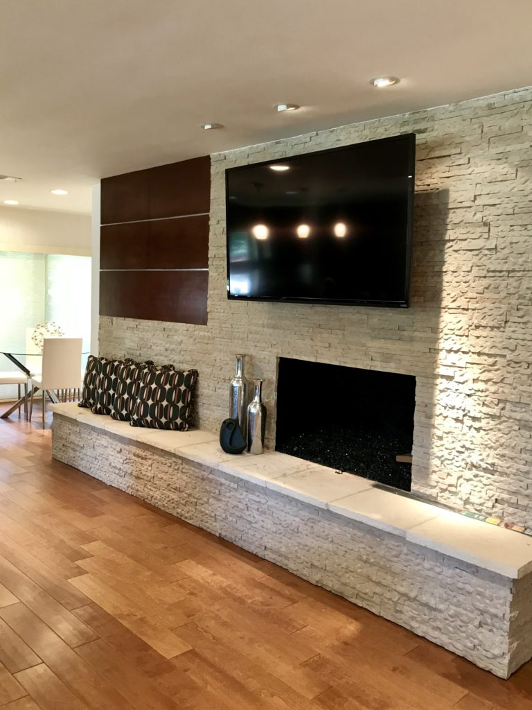 Modern home stage with details around the fireplace