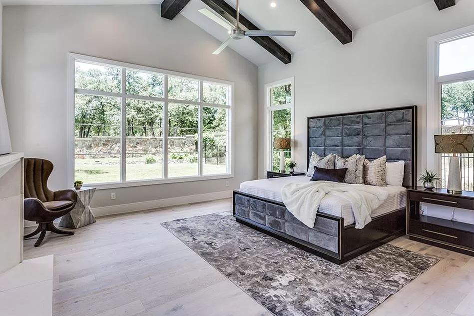 Bedroom interior with gray, white and wood tone color palette.