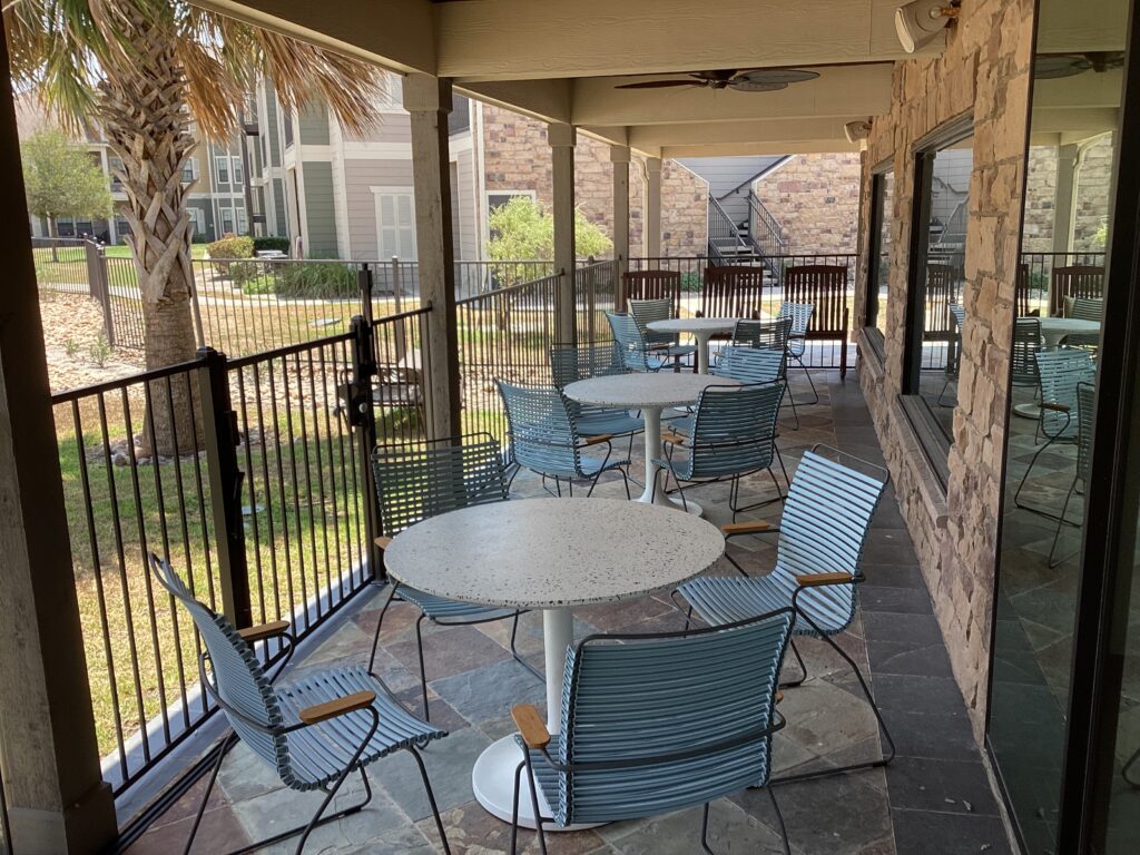 New chairs and tables for ample seating on the outdoor patio.