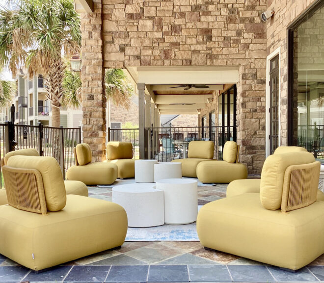 Multifamily project showing new outdoor patio yellow chairs