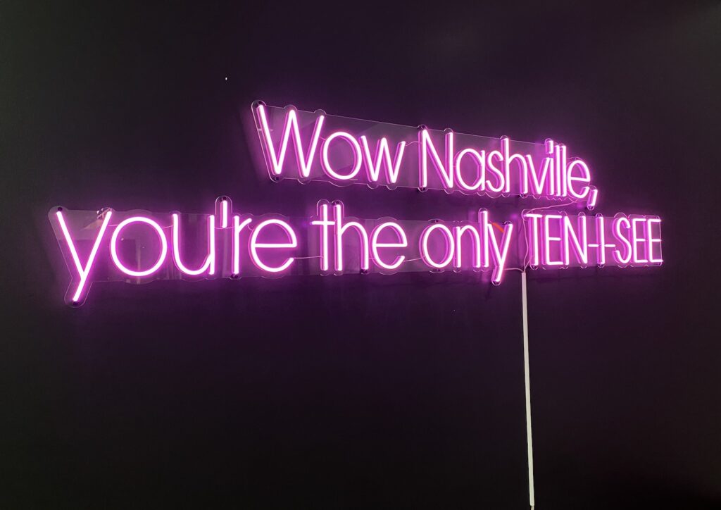 Neon sign that says "Wow Nashville, You're the only Ten-I-See"
